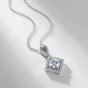 Elegant S925 silver necklace with square halo pendant and brilliant red center gemstone