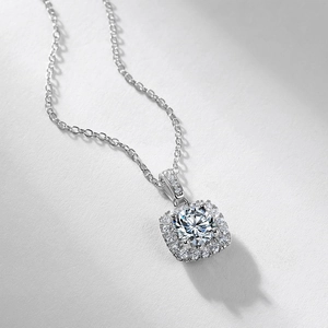 Classic square halo necklace in S925 silver with a large round ruby and pave diamonds