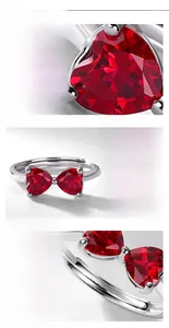 Detailed view of heart-cut red rubies set in S925 silver with bow-knot design
