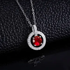 S925 sterling silver necklace featuring a round red gemstone pendant with zircon halo