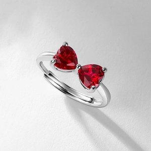 Adjustable S925 silver ring with red heart-shaped gemstone bow in a minimalist style