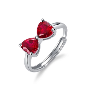 Elegant 925 silver ring featuring a red heart-shaped ruby bow in an adjustable open design