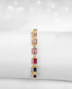 Macro detail of S925 silver rainbow bracelet with multi-color rectangular cubic zirconia