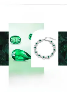 Macro detail of S925 silver flower links set with lab emeralds and white zircon stones