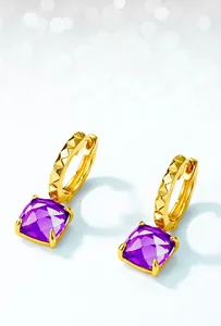 Detailed macro view of S925 gold-plated earrings with purple square amethyst and textured hoop