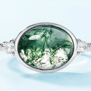 Oval moss agate ring with S925 sterling silver band and sparkling side stones