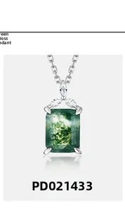 Detail of rectangular moss agate pendant with silver bail and marquise stones