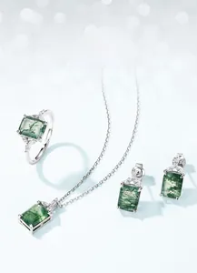 Detail of S925 silver jewelry set featuring rectangular green moss agate and white stones