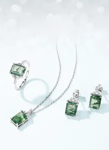 Macro detail of geometric moss agate jewelry set featuring S925 silver and rectangle stones