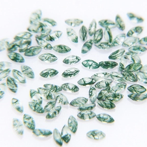 Marquise cut natural moss agate gemstones with green inclusions in a bulk collection