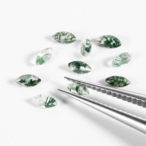 Marquise cut natural moss agate stones with green moss inclusions on white background