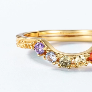 Rainbow bridge gold ring with colorful round gems and vine leaf relief carving