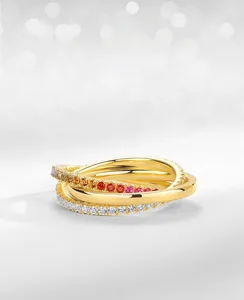 Macro detail of S925 silver stamp and colorful rainbow cubic zirconia on triple-layered ring