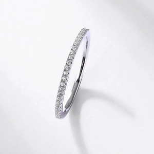 Elegant micro-pave moissanite stackable ring in silver finish with sparkling stones