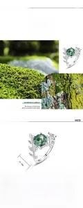 Detailed macro view of S925 silver ring featuring leaf motifs and green moss agate stone