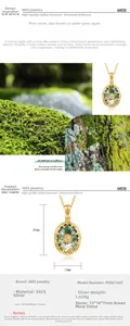 Détail du pendentif ovale en agate mousse, argent S925 plaqué or avec pierre d'opale