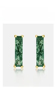 Detail of rectangular green moss agate earrings with gold four-prong setting