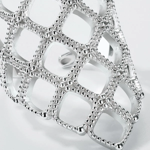 Close-up of S925 sterling silver hollow grid ring with fine bead texture detail