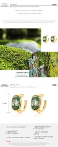 Macro detail of S925 silver ear cuffs featuring green moss agate and 10K gold plating