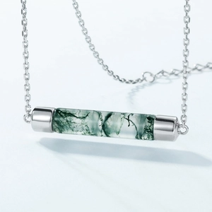 Minimalist S925 silver necklace with cylindrical green moss agate pendant on gray ground