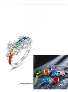 Macro shot of colorful square-cut rainbow cubic zirconia stones on S925 silver crown ring