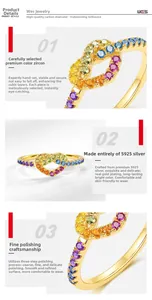 Macro view of S925 silver heart ring with colorful cubic zirconia and polished gold plating