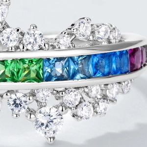 Macro detail of S925 silver ring featuring rainbow gradient gemstones and zircon pavé setting