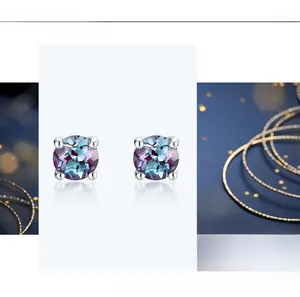 Detail of four-prong round cut alexandrite stud earrings in S925 sterling silver