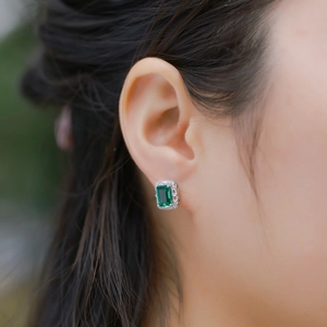 Elegant emerald cut green gemstone halo stud earrings in S925 sterling silver settings