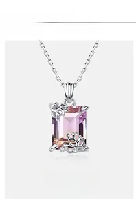 Detailed view of emerald cut ametrine stone set in coral style silver mounting
