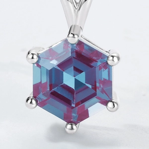 Macro detail of hexagonal alexandrite pendant with s925 silver six-claw setting