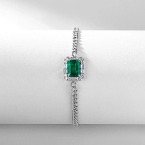 Classic silver S925 chain bracelet featuring a geometric emerald and sparkling diamonds