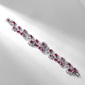 Luxury S925 silver bracelet featuring rose-shaped links and pigeon blood red rubies