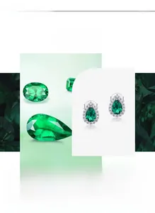 Close-up of pear-cut emerald earrings with high-carbon diamond and white zircon setting