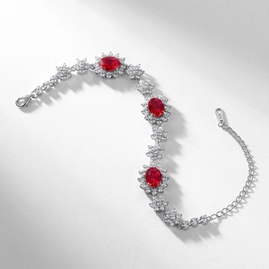 Elegant S925 sterling silver bracelet featuring red sunflower-shaped lab ruby gemstones