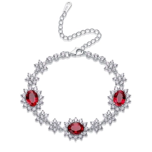 Luxurious S925 silver bracelet featuring sunflower patterns and red synthetic rubies