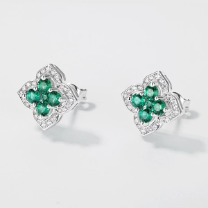 Elegant S925 silver four-leaf clover stud earrings with green emerald-cut gemstones