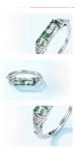 Vista de primer plano de ágata musgosa verde en plata S925 con diamantes laterales