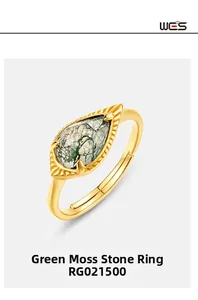 Macro detail of pear-cut green moss agate stone on adjustable gold plated ring