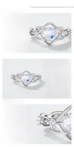 Detailed macro view of S925 silver ring featuring moonstone and hand-set carbon diamonds
