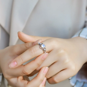 Elegant S925 sterling silver open ring with blue moonstone and pavé zircon accents