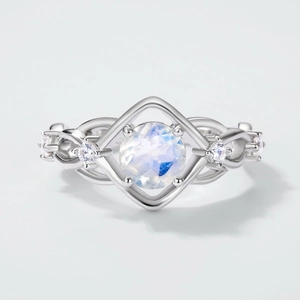 S925 silver open ring featuring a blue moonstone and sparkling white zircon accents