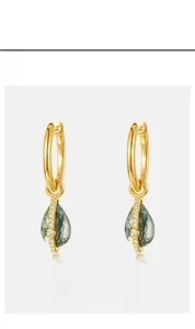 Macro view of teardrop green moss agate earrings in gold plated S925 silver setting