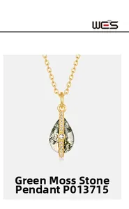 Detail of water drop green moss agate pendant with gold vertical diamond bar inlay