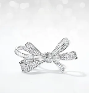 Close-up of S925 silver bow ring with shimmering white zircon stones and micro-pave details