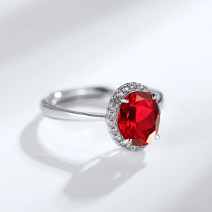 Elegant S925 silver halo ring featuring an oval red ruby and sparkling zircon accents