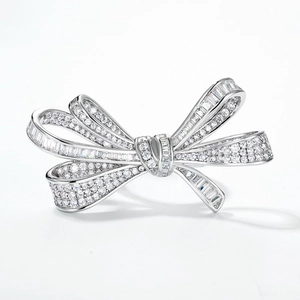 Elegant S925 sterling silver bow ring with shimmering cubic zirconia in a modern design