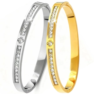 Gold and silver stainless steel bangles with clover motif and zircon inlays