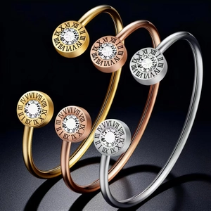 Three-piece stainless steel open bangles set in gold silver rose gold with roman numerals