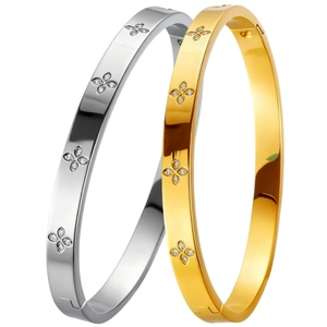 Gold and silver stainless steel bangles with clover patterns and sparkling crystals